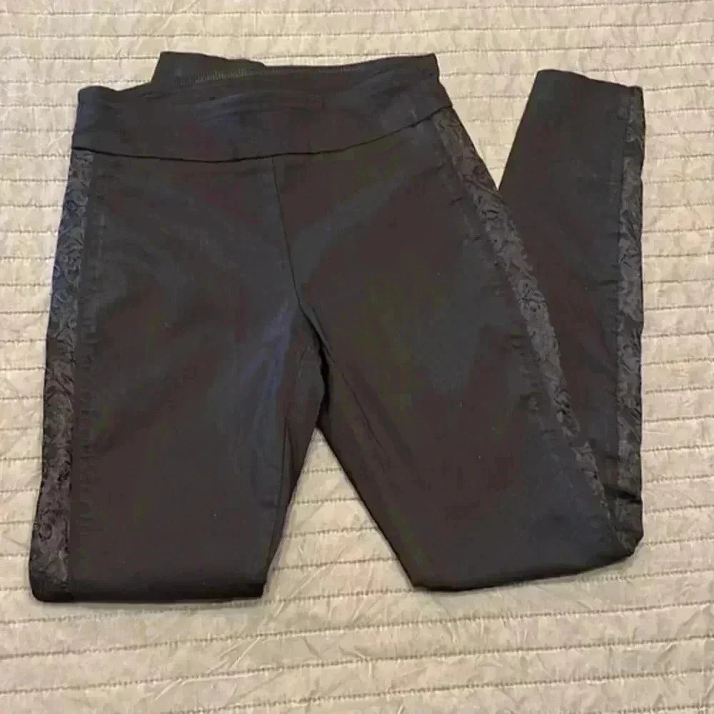 Great, pull on dress pants with lace detail on side
